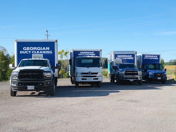 Georgian Duct Cleaning service trucks lined up at the company yard